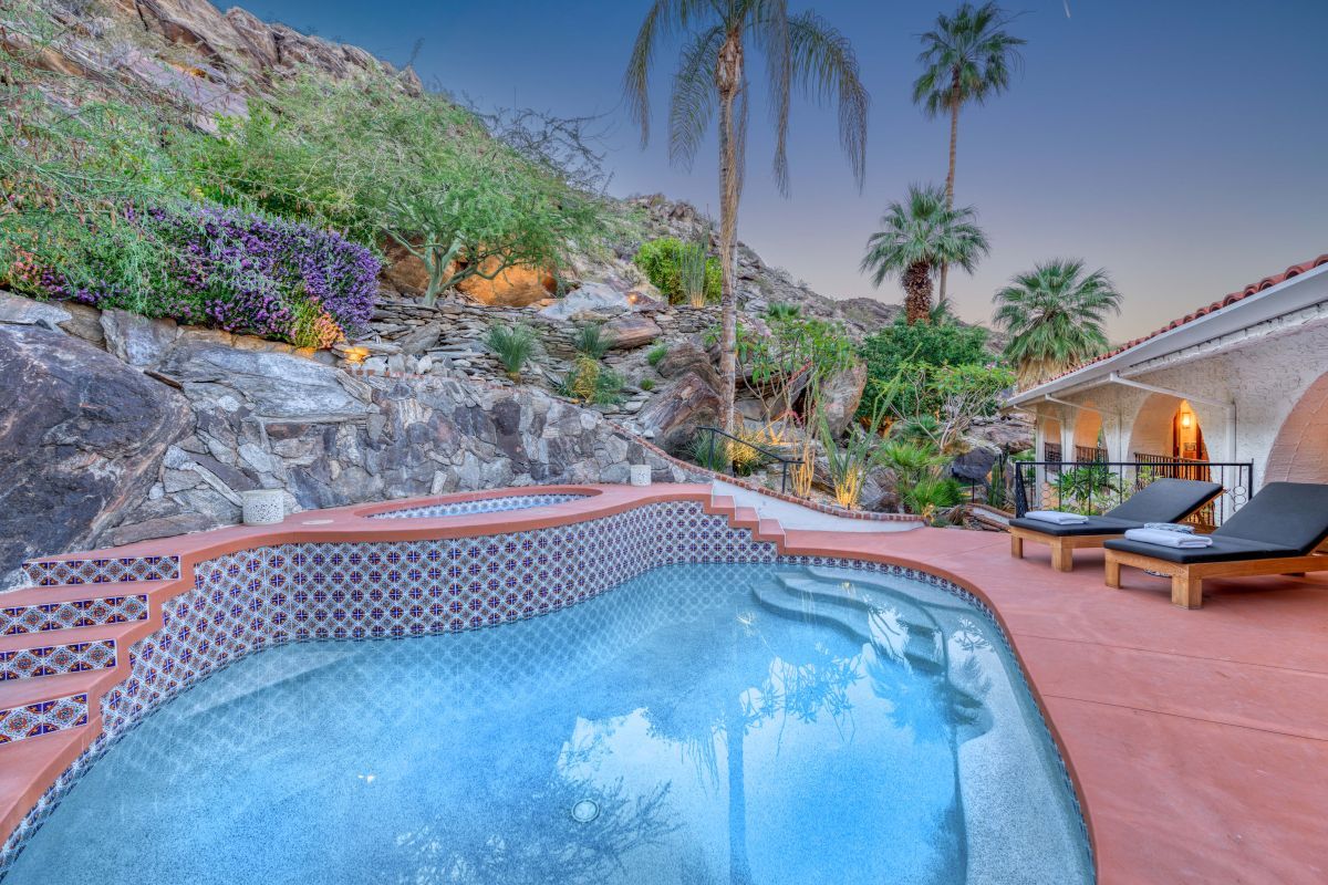 Ridge-House-Pool | Oranj Palm Vacation Homes the pool area of Palm Springs vacation rental